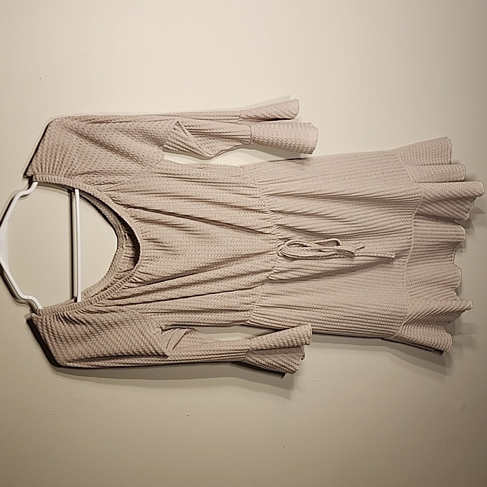 Tan Dress elestic collar, mid thigh, ruffles on the skeeves and on the bottom